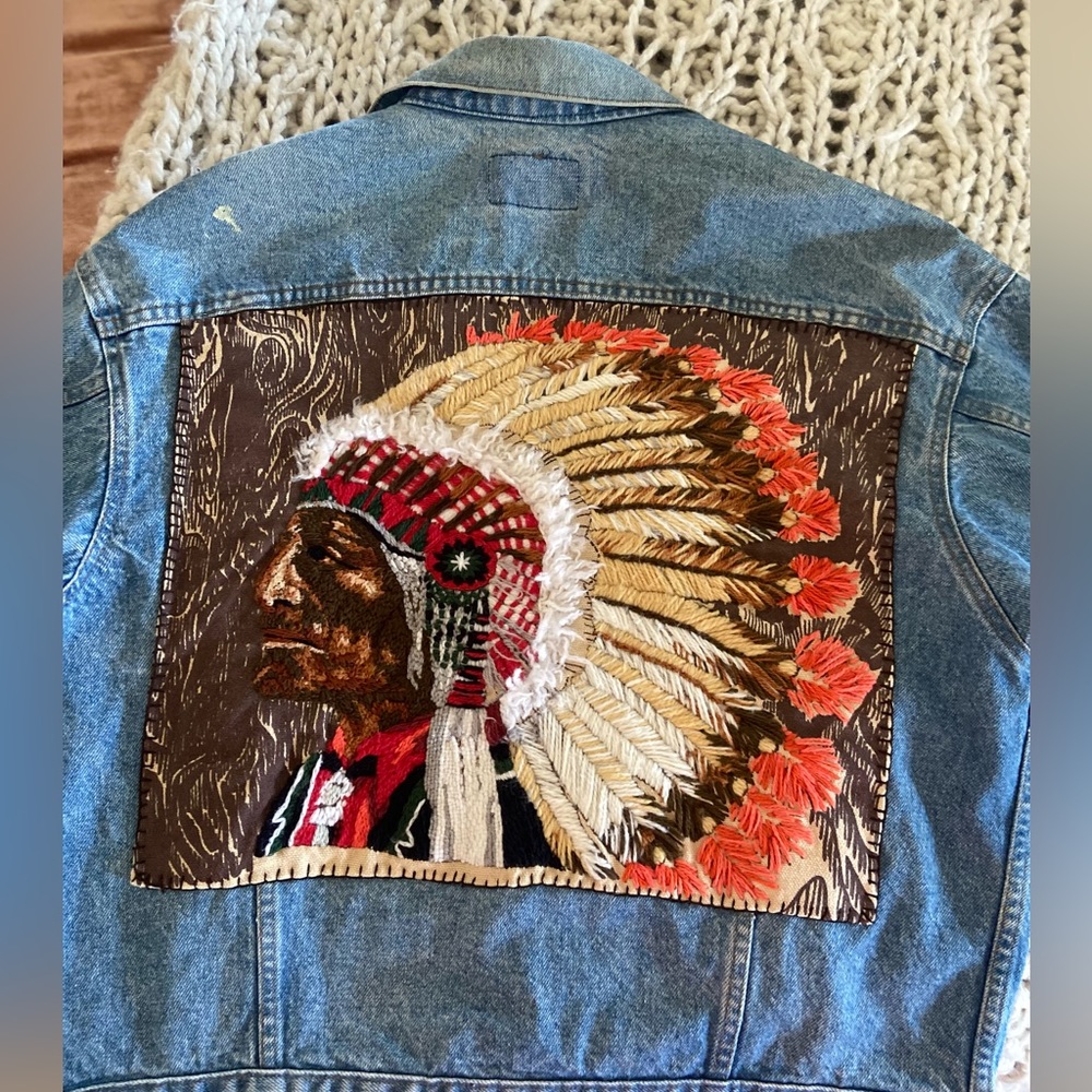 One of a kind vintage Levi jacket with hand embroidery.
